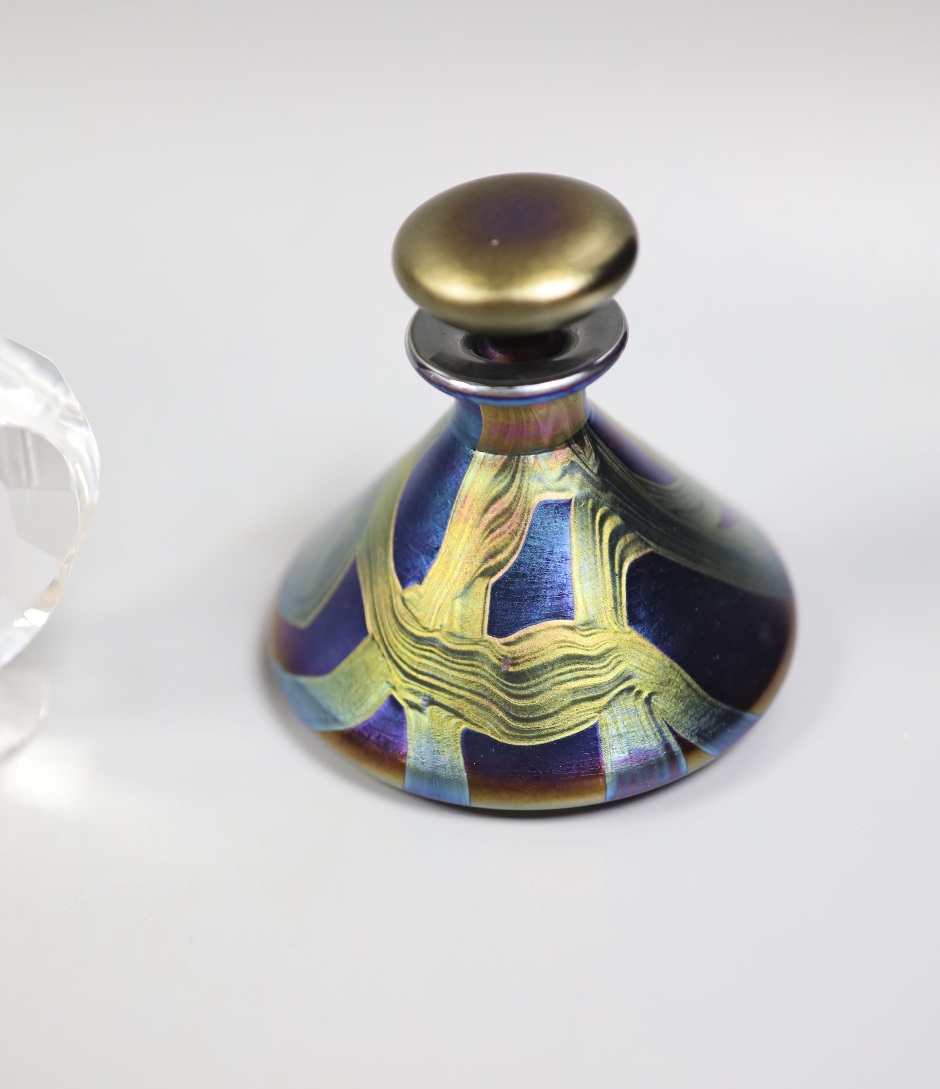 A collection of various glass scent bottles including a Lalique flower scent bottle and Bohemian examples, tallest 20.5cm